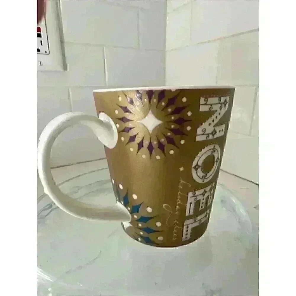 2006 Starbucks NOEL Gold Christmas Holiday Coffee Mug 14 oz
